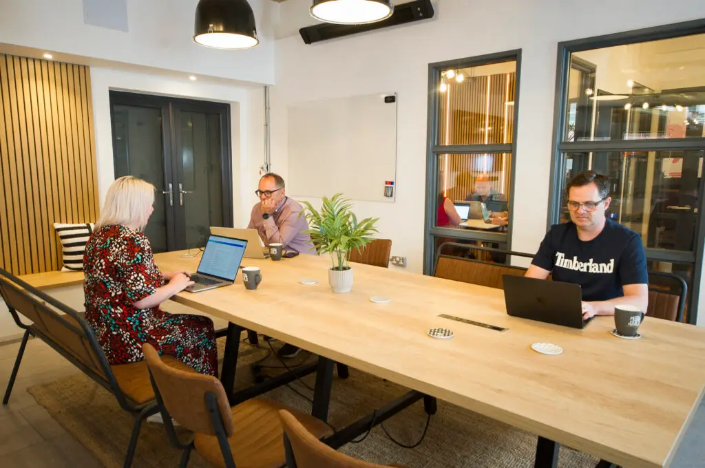 Members sitting in our downstairs Coworking area