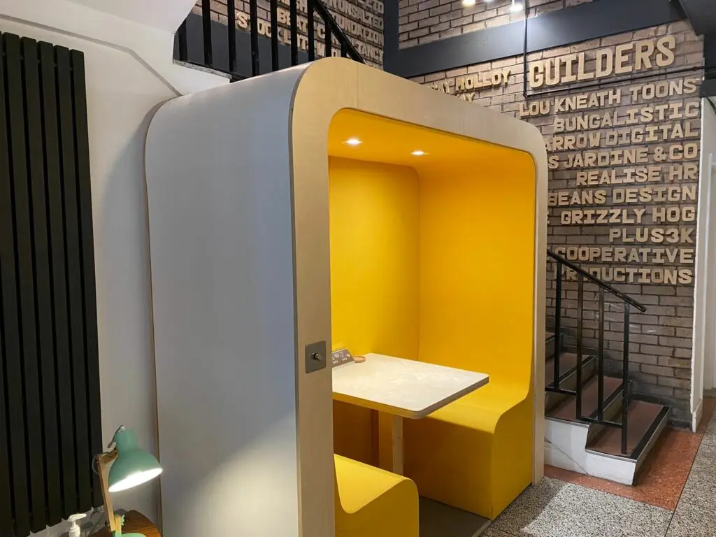 Yellow 2 person booth.